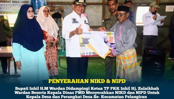 Bupati Inhil   Serahkan Nomor Induk Kepala Desa (NIKD) dan Nomor Induk Perangkat Desa (NIPD)